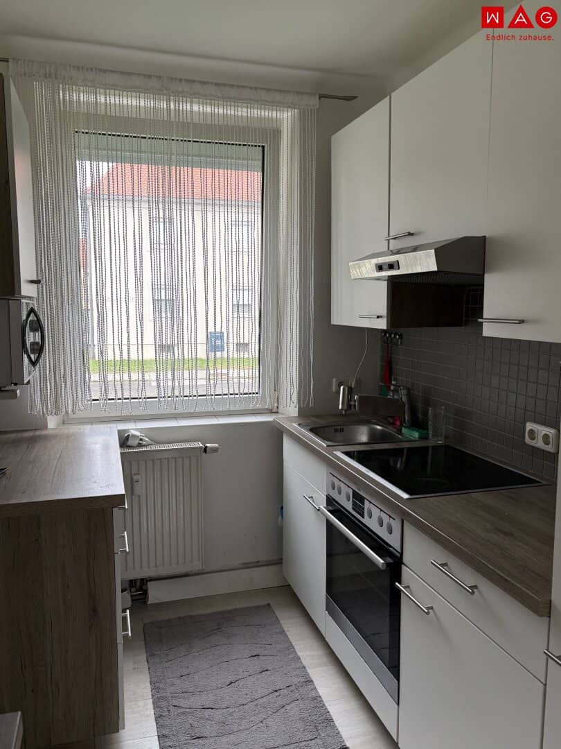 Special residential quality in a wonderful green location: charming 2-room ground floor apartment with high-quality bathroom, practical layout and great value for money available from December