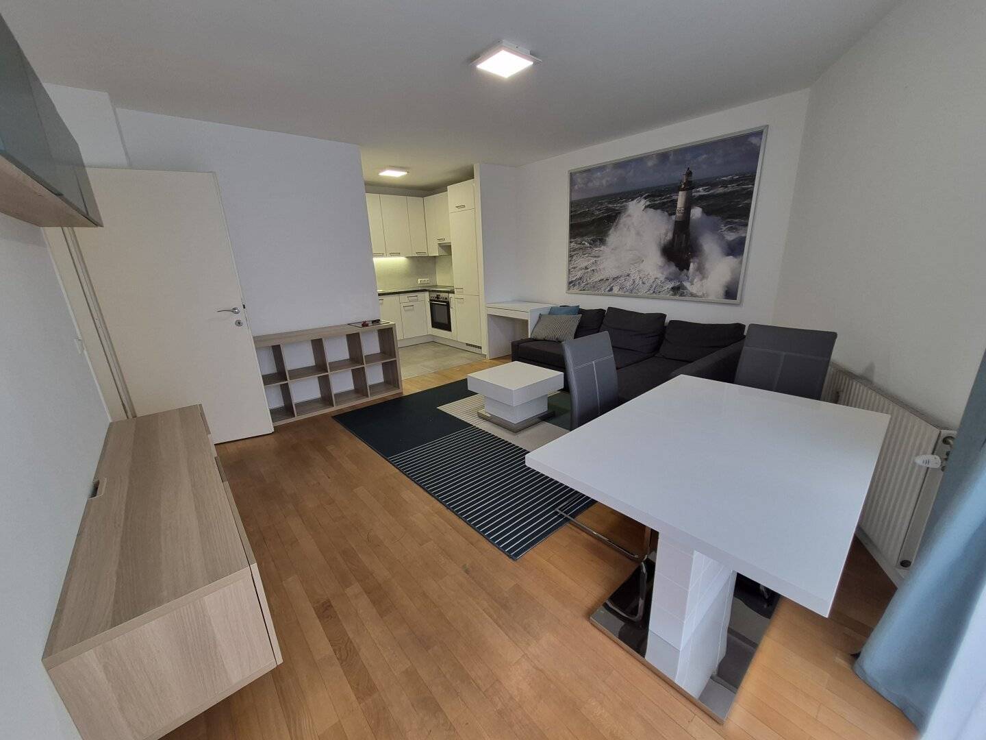 Inner courtyard oasis 2-room new-build apartment with balcony and optional garage space