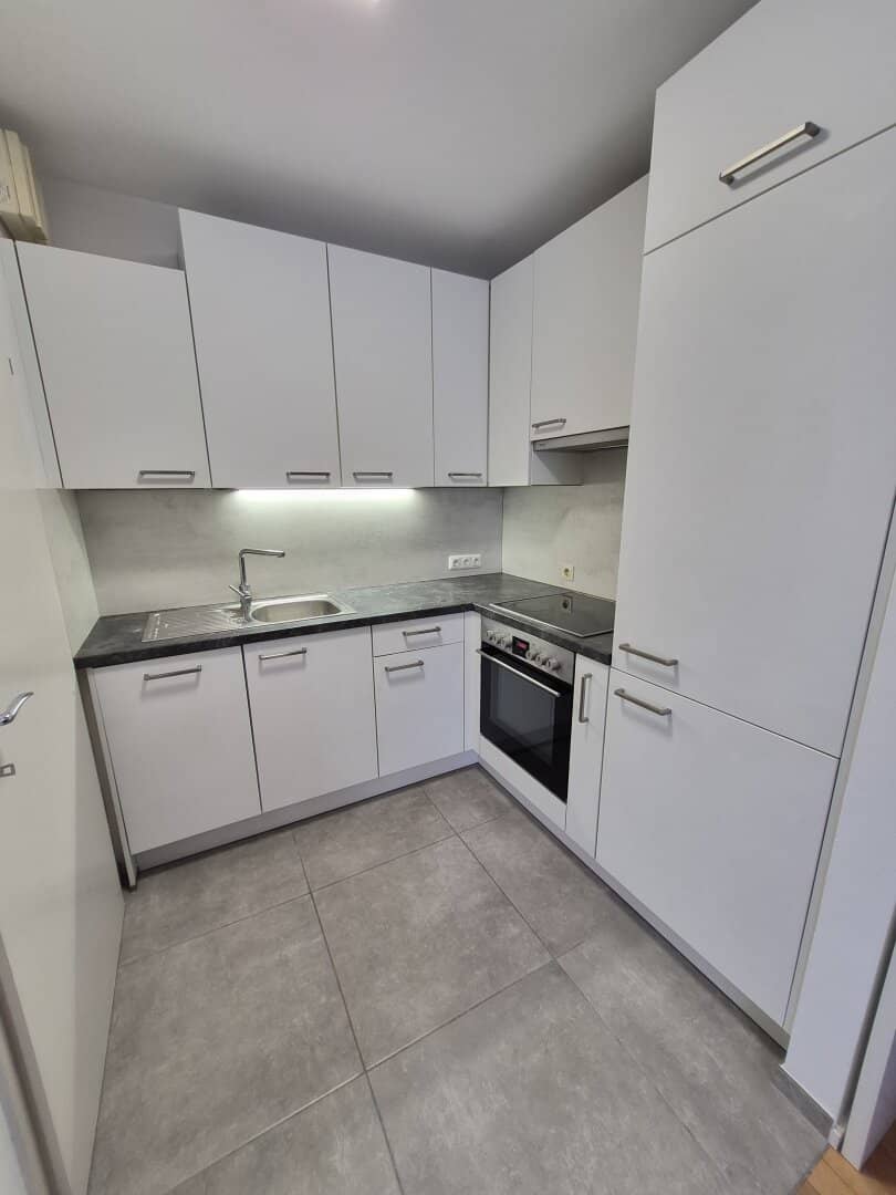 Inner courtyard oasis 2-room new-build apartment with balcony and optional garage space
