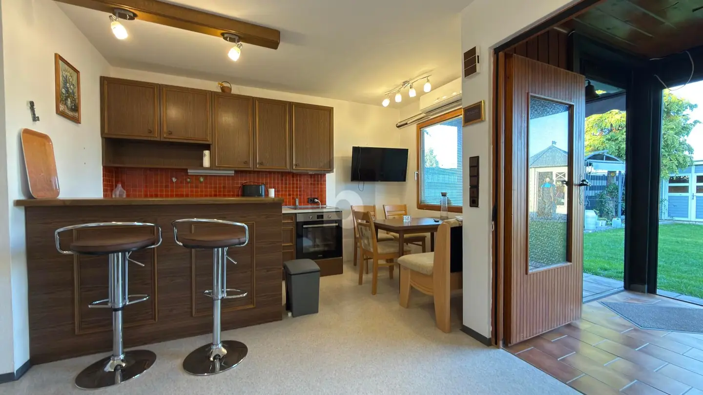 Holiday apartment with garden pool and covered barbecue