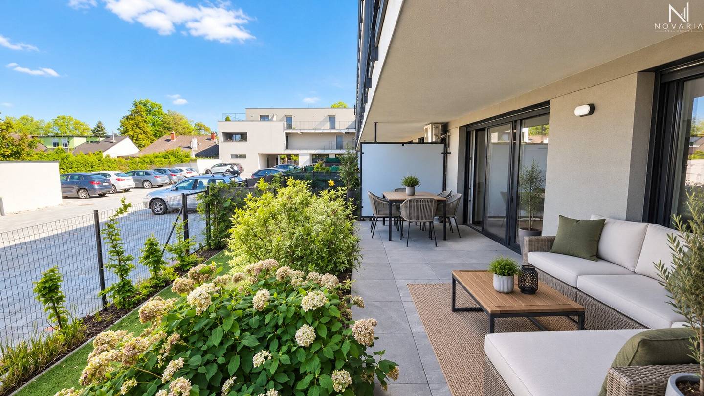 Like-new 4-room garden apartment with large loggia and parking space