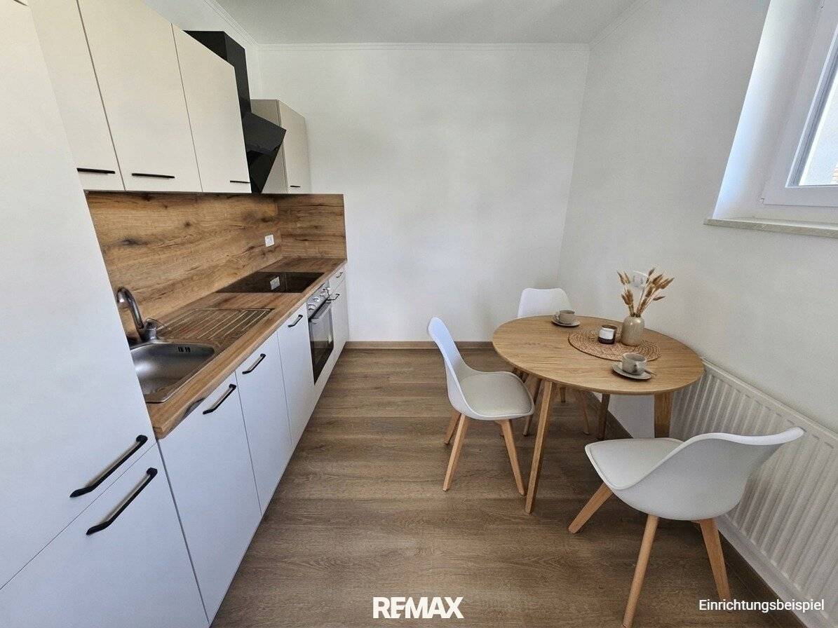 Compact renovated rental apartment with new fitted kitchen and parking