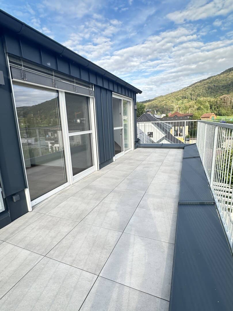Modern living in Elsbethen – New build apartment with balcony and roof terrace