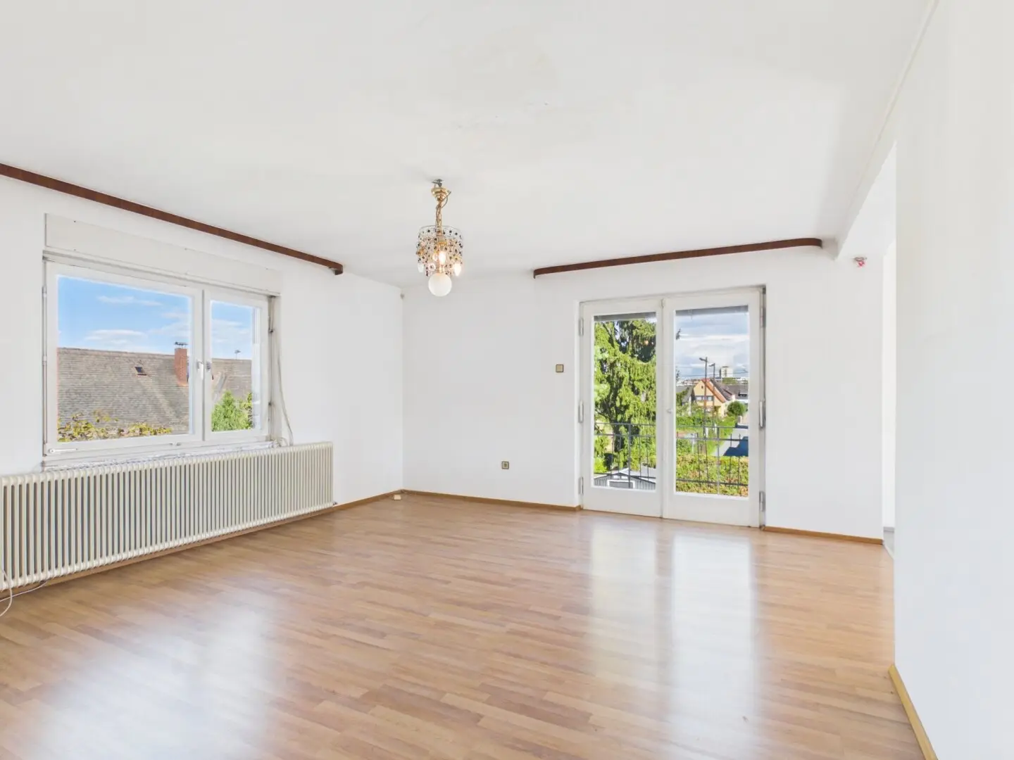 Two-family house with garden and double garage, fully basemented – over 350m² total area