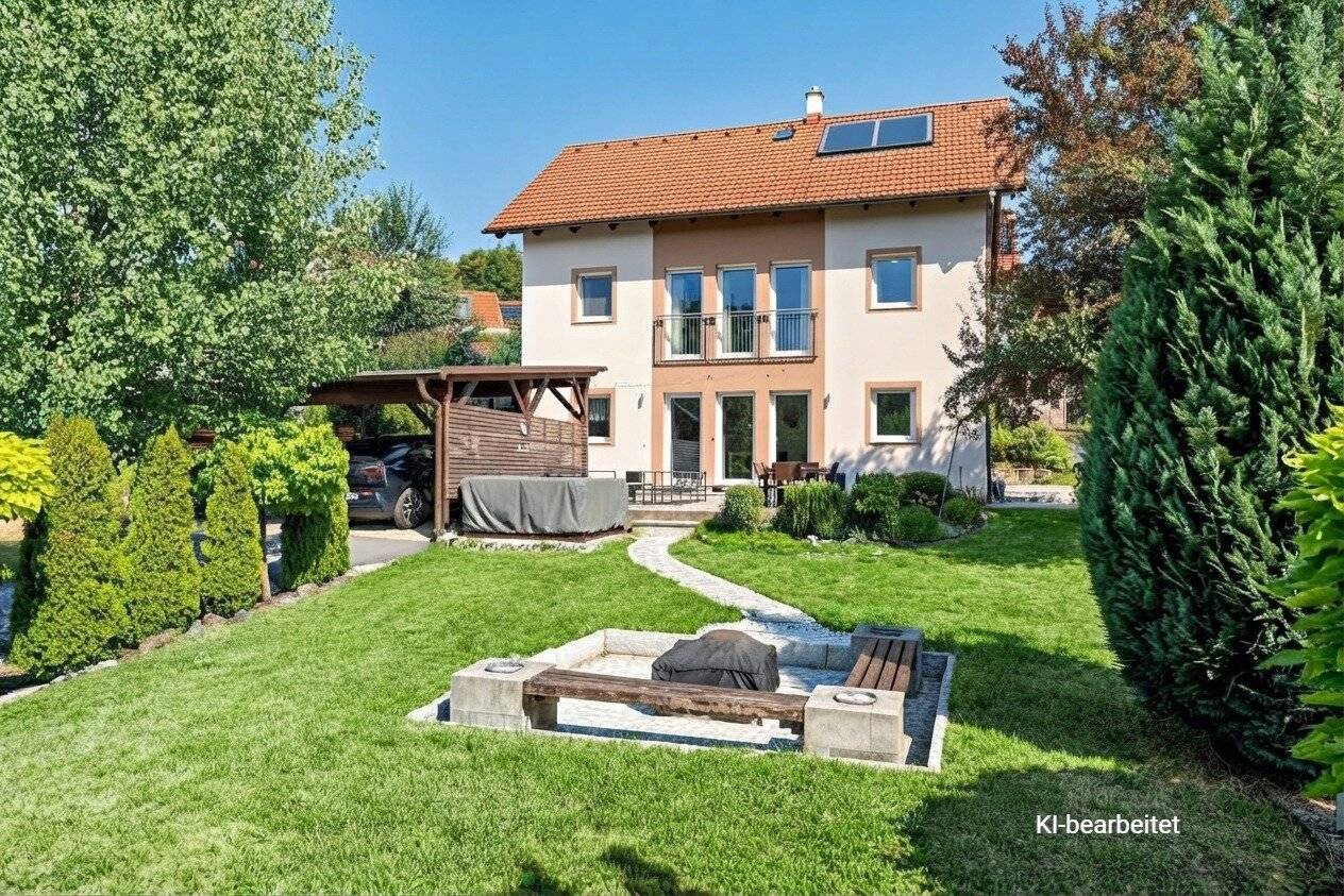 Viel Platz zum Leben – gepflegtes Familienhaus mit großem Garten und Grünblick