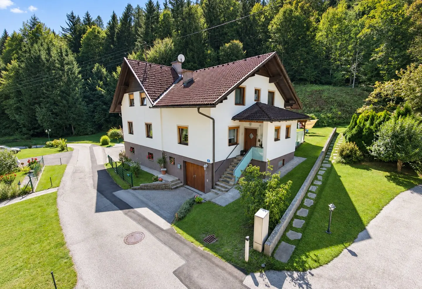 Spacious family home with two residential units, balcony and terrace