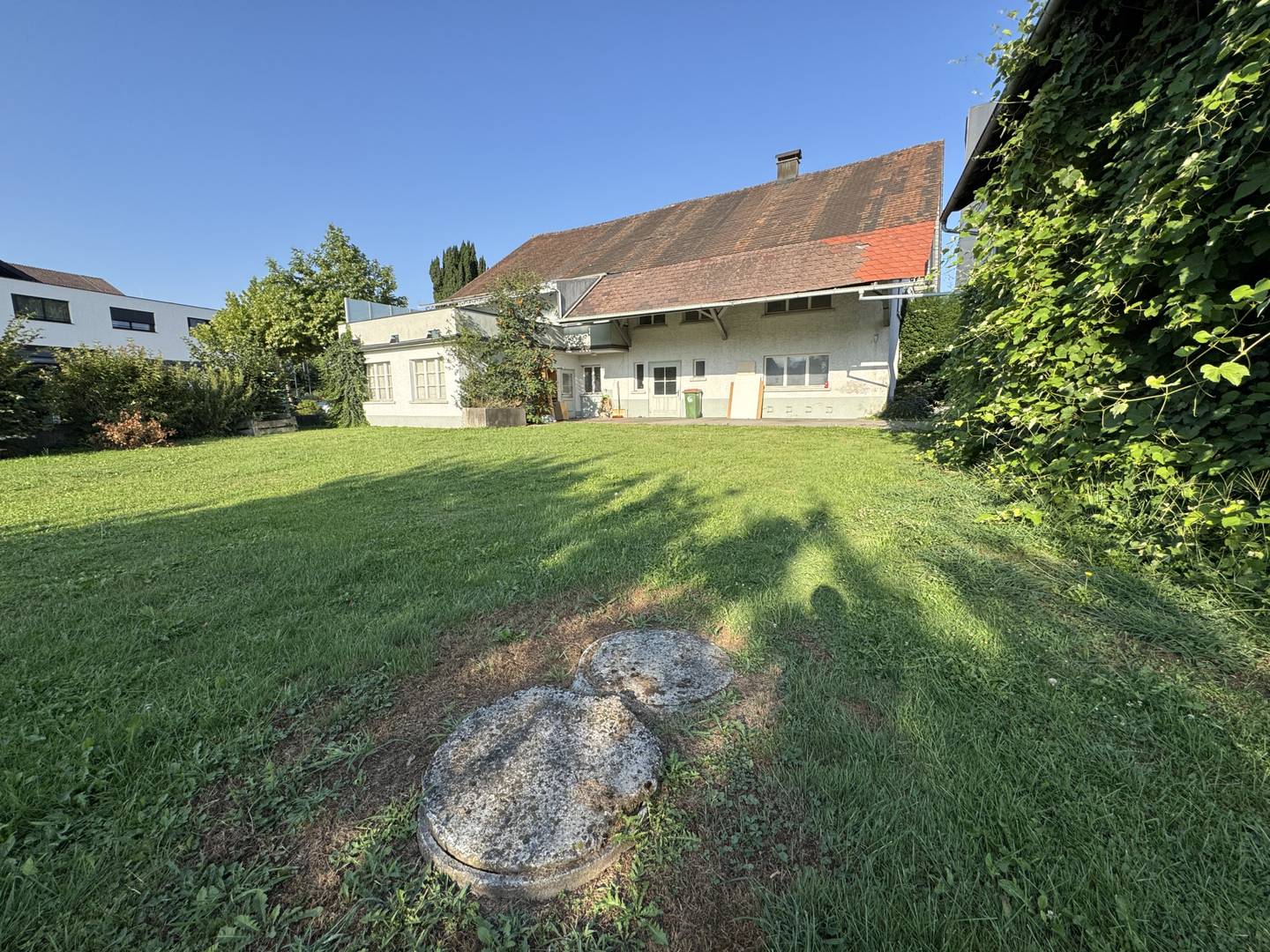Sunny building plot with existing house near border Wohnung