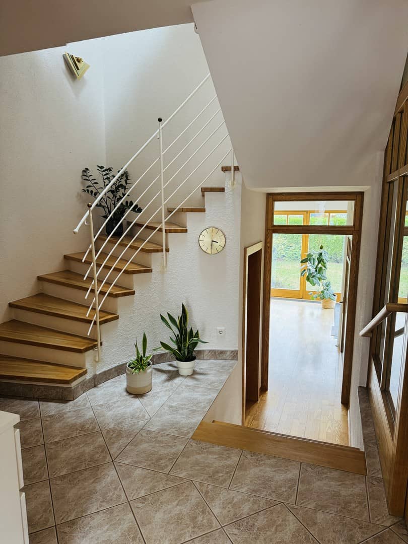 Sunny maisonette apartment with orangery and garden