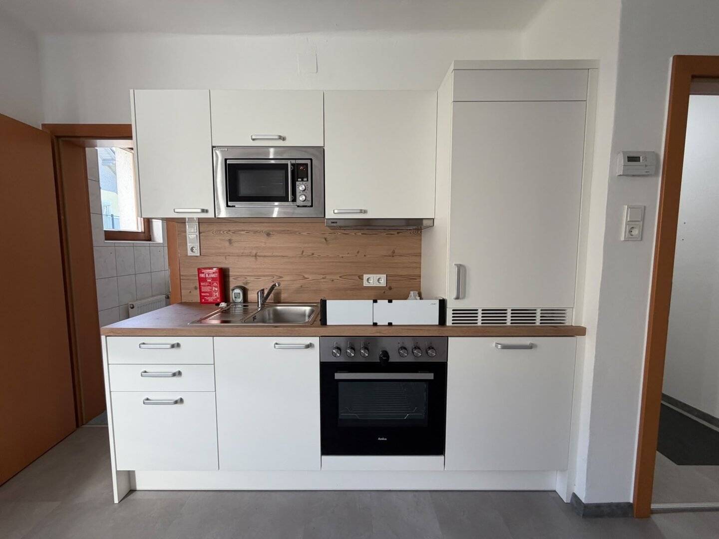 Renovated condominium with south-facing balcony on the 1st floor