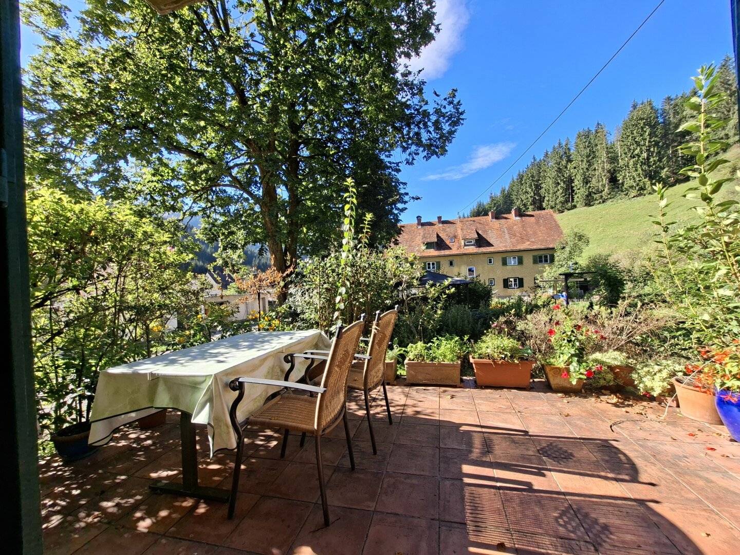 Sanierungsjuwel - Eigentumswohnung mit Garten, Terrasse und Garage