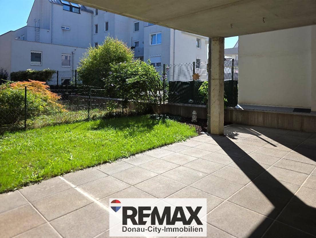 Wohnung mit überdachter Terrasse und Privatgarten