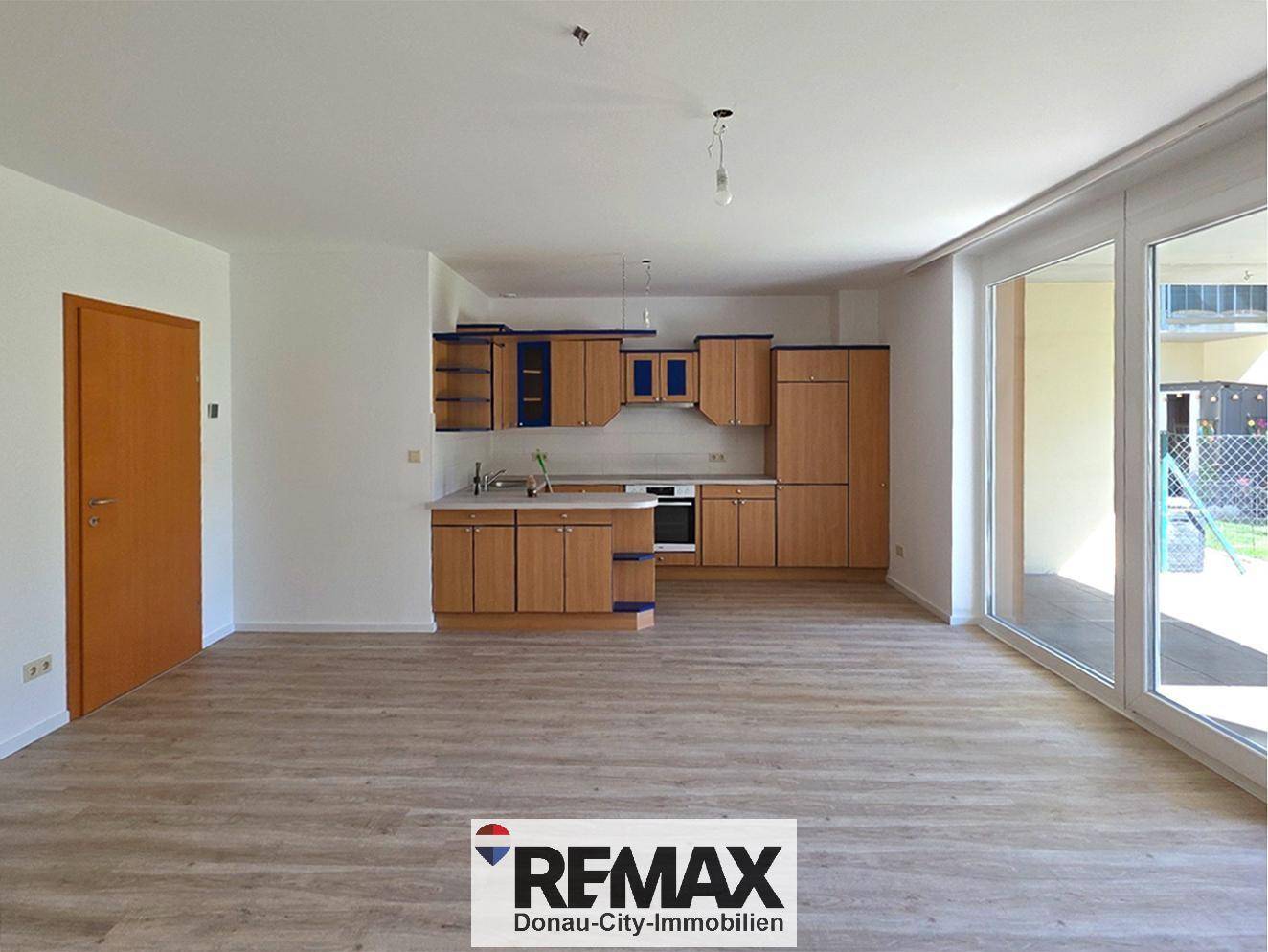 Wohnung mit überdachter Terrasse und Privatgarten