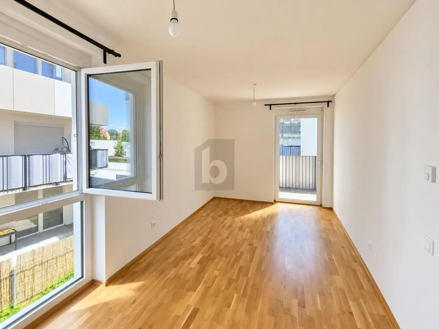 Apartment with large balcony and courtyard view