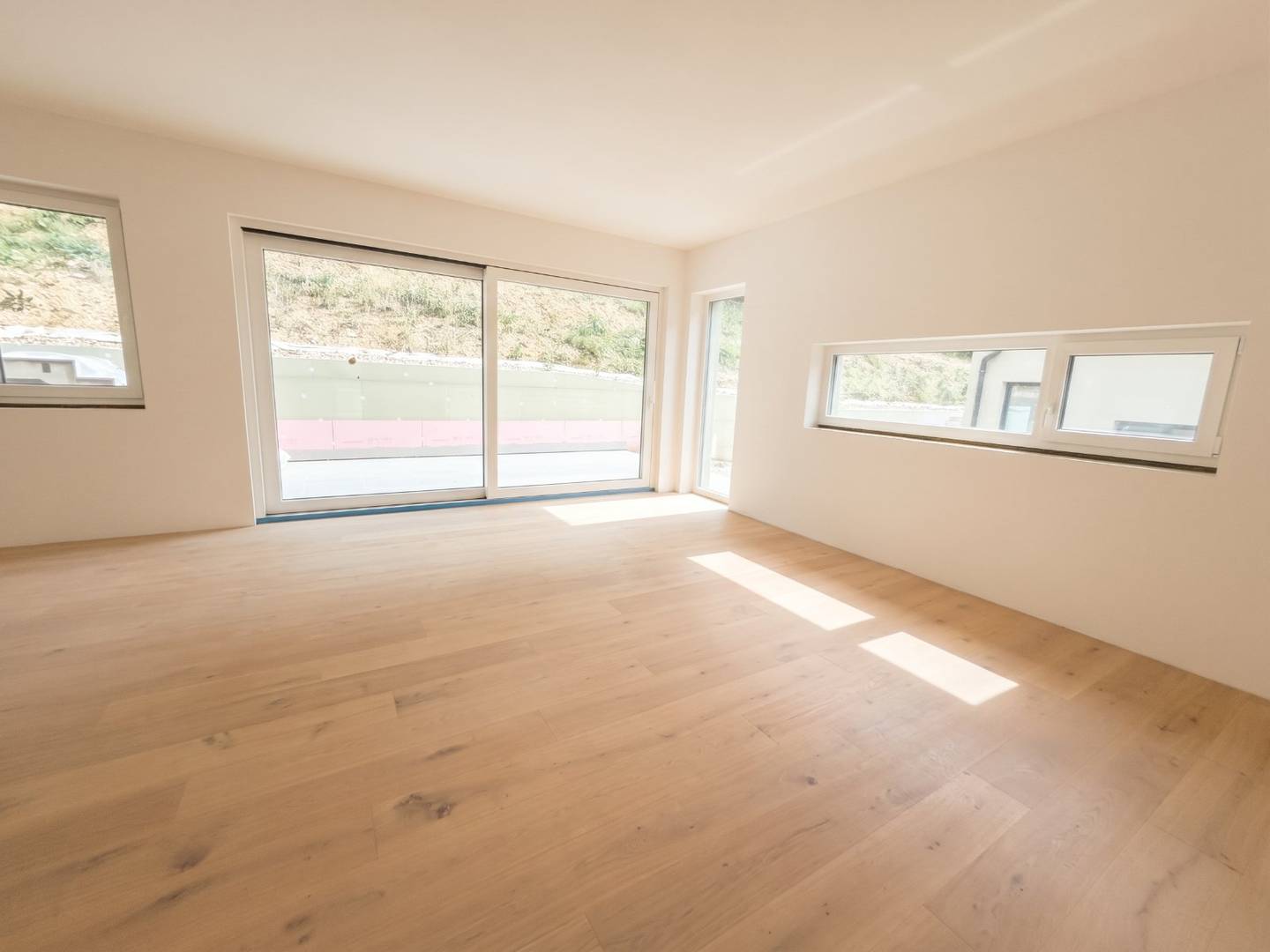 Erstbezug Maisonettewohnung mit Garten und Garage