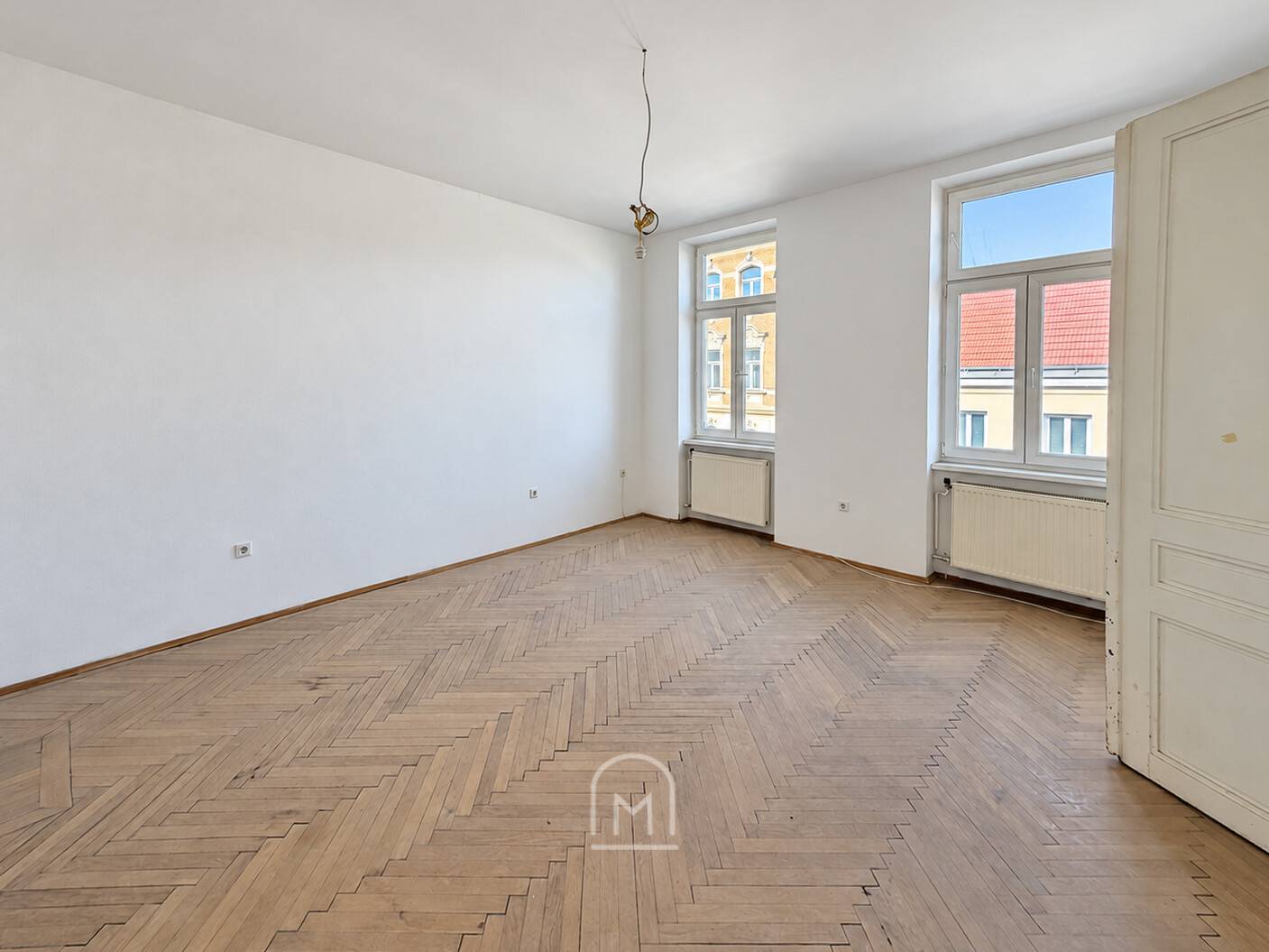 Light filled altbauwohnung with original herringbone parquet