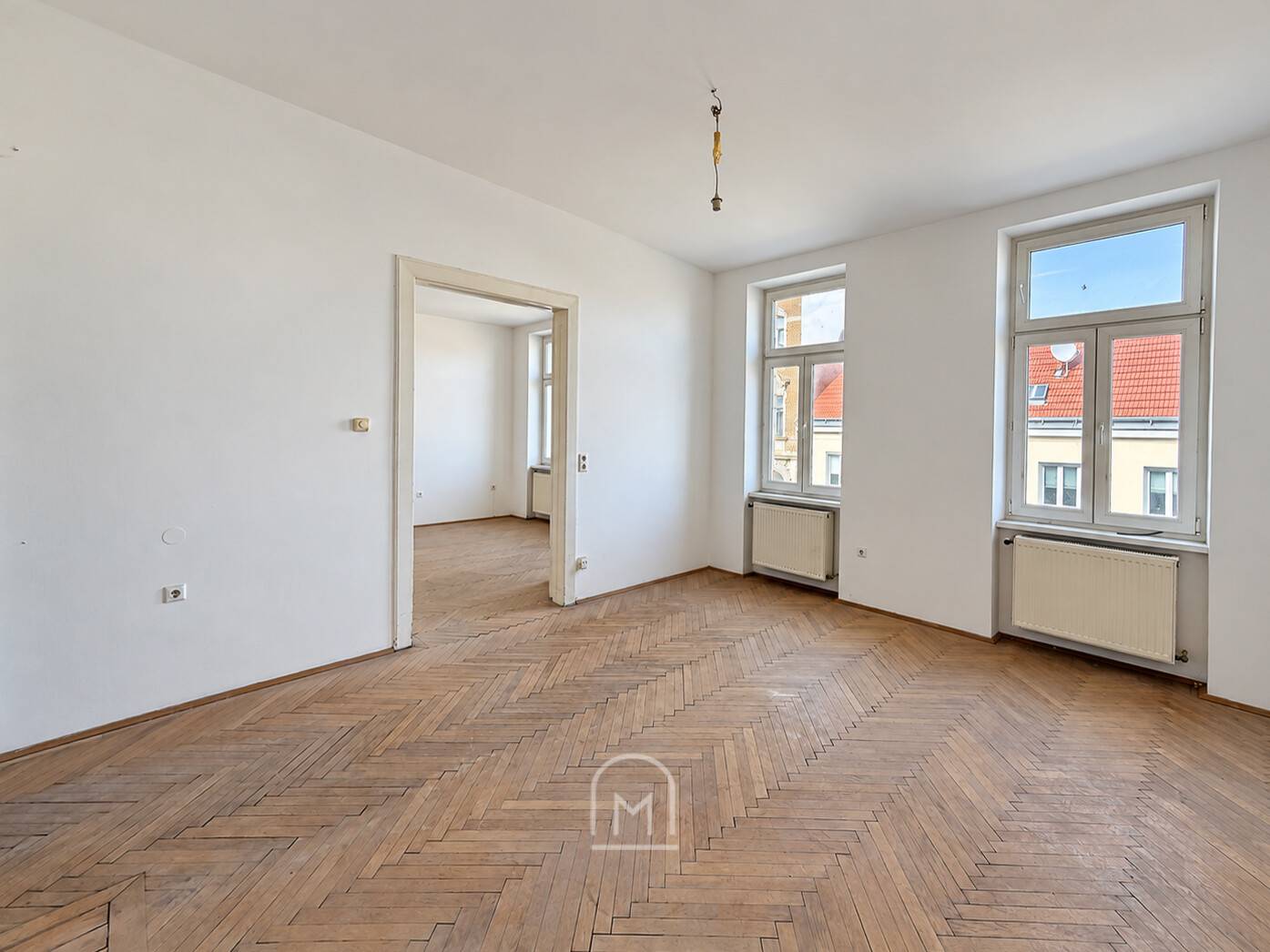 Light filled altbauwohnung with original herringbone parquet