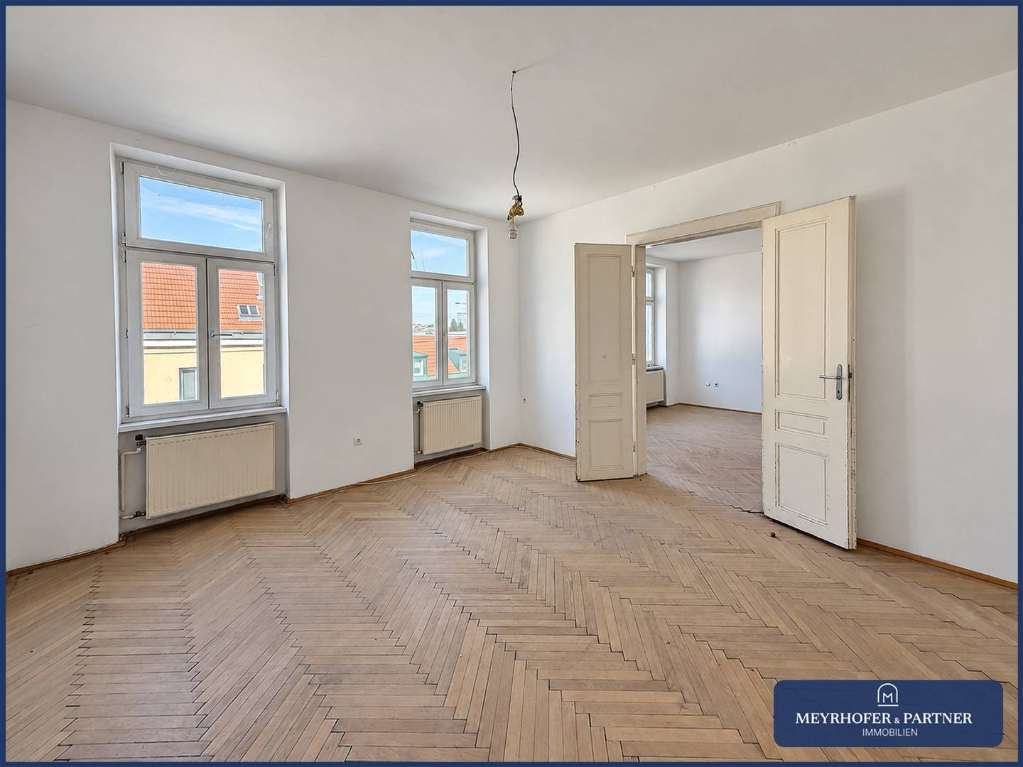 Light filled altbauwohnung with original herringbone parquet