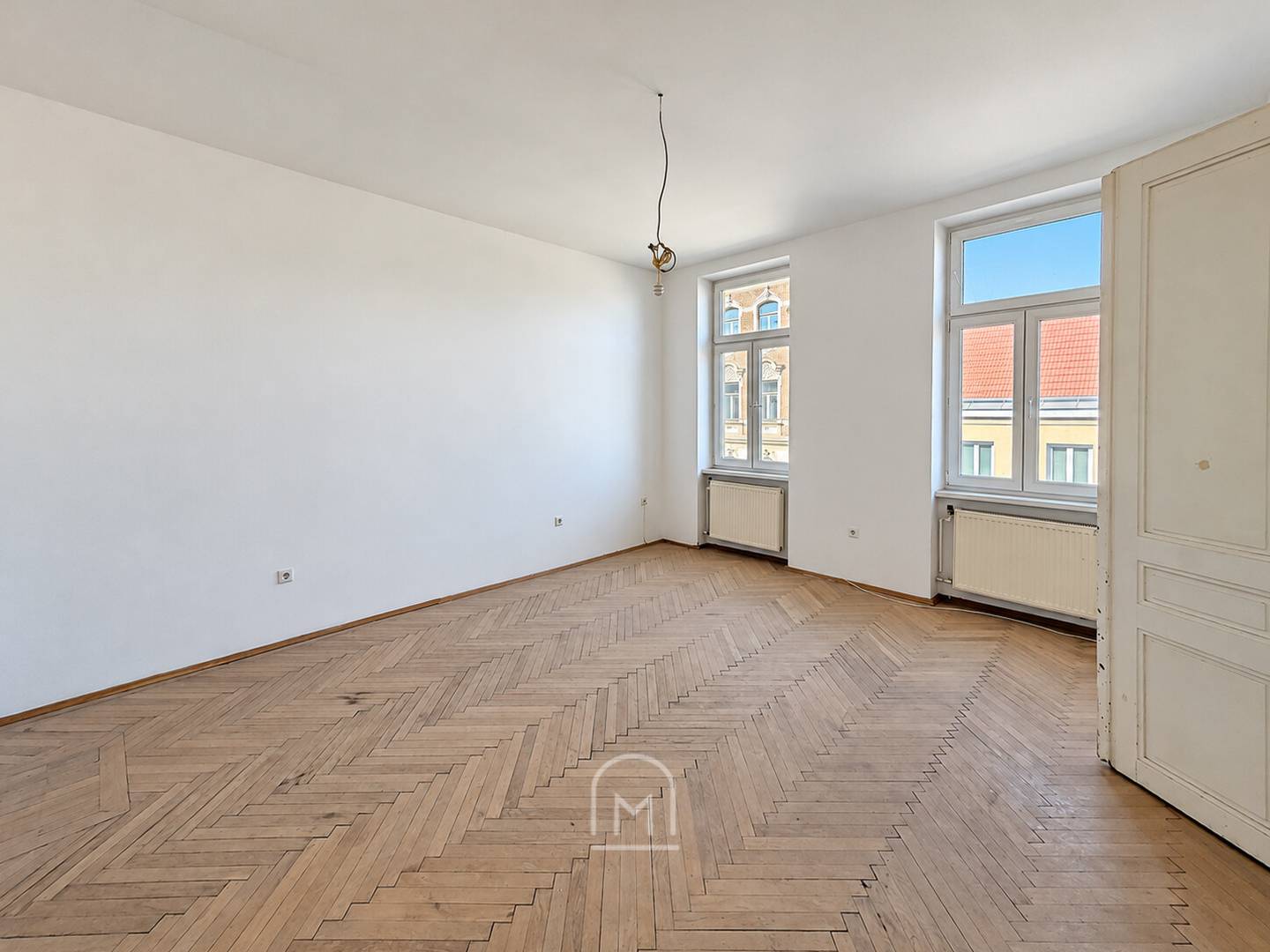 Light filled altbauwohnung with original herringbone parquet