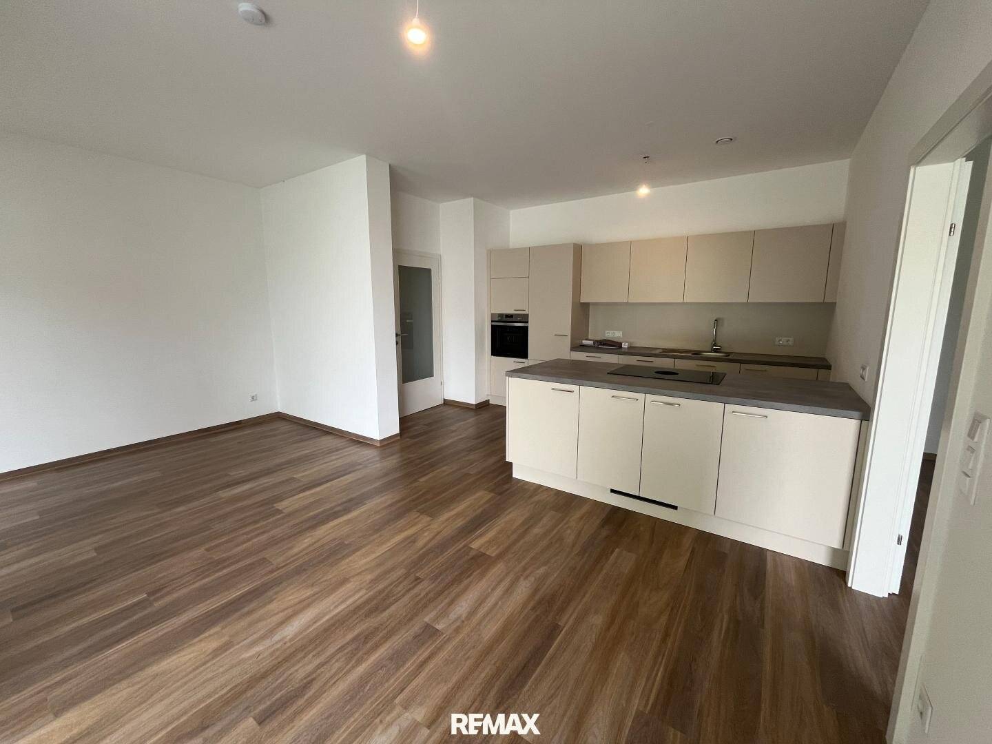 Modern 3-room apartment with garden in the town centre