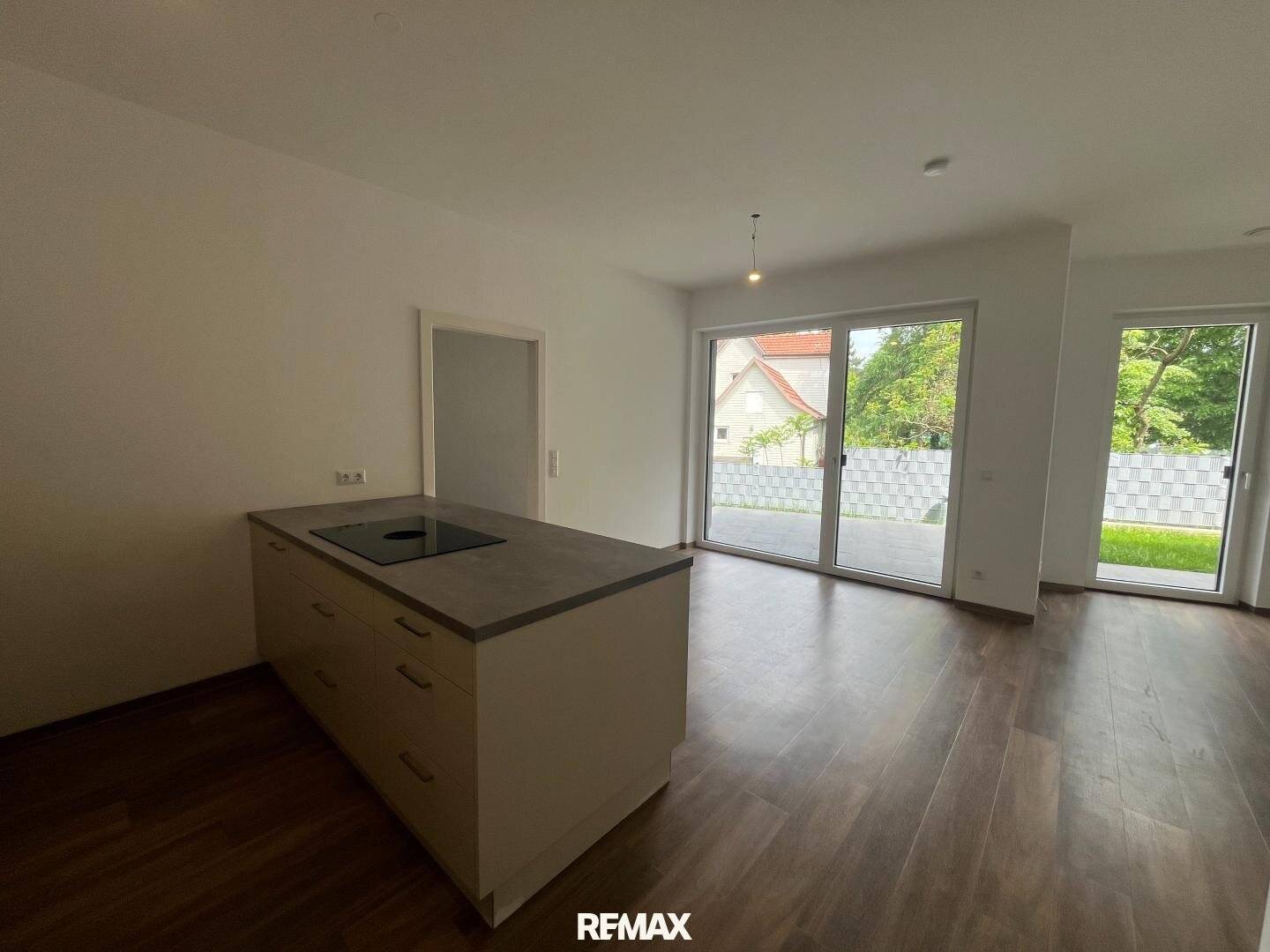Modern 3-room apartment with garden in the town centre
