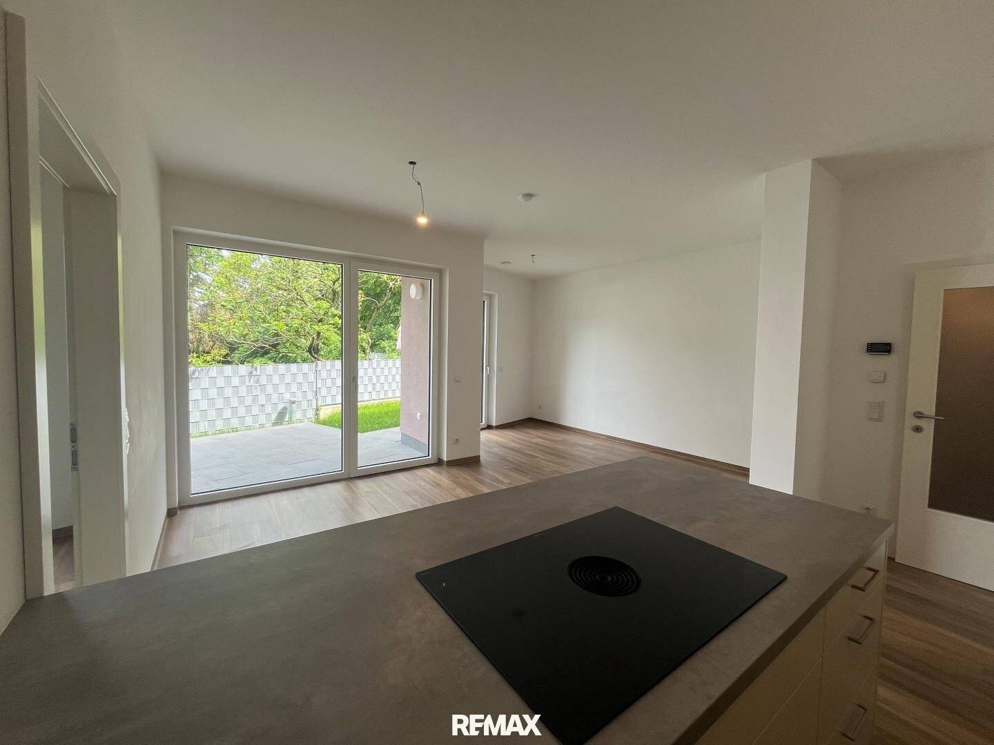 Modern 3-room apartment with garden in the town centre