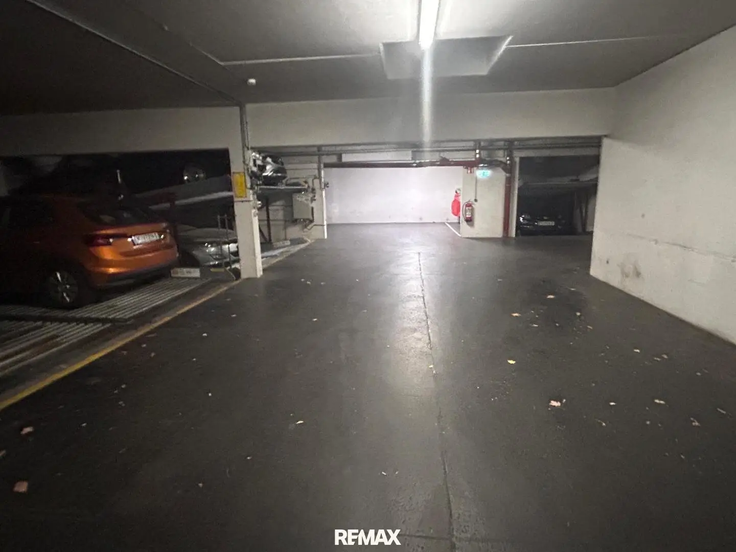 Underground parking space for small to mid-size vehicles