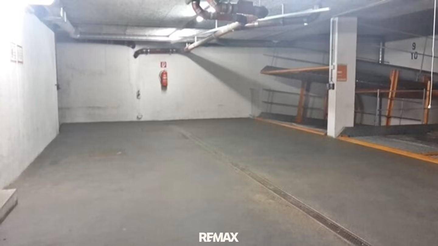 Garage parking space for small to mid-size vehicles