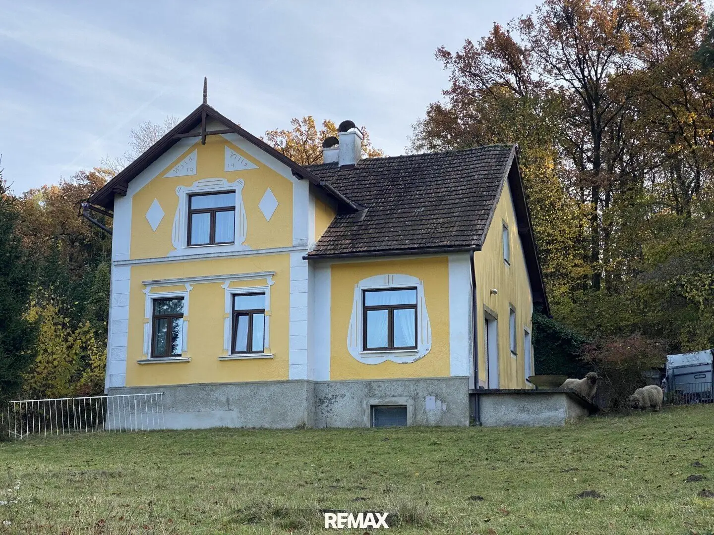 Turn of the Century Style House with Forest
