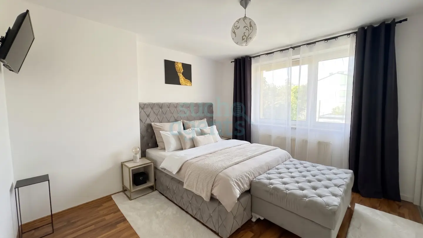 Bright apartment with balcony and air conditioner