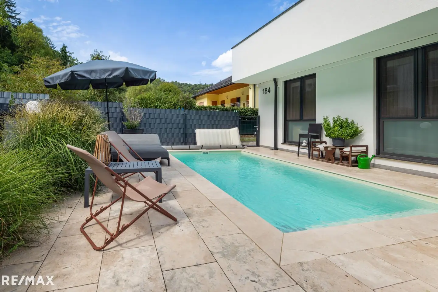 Ground floor apartment with private garden and pool