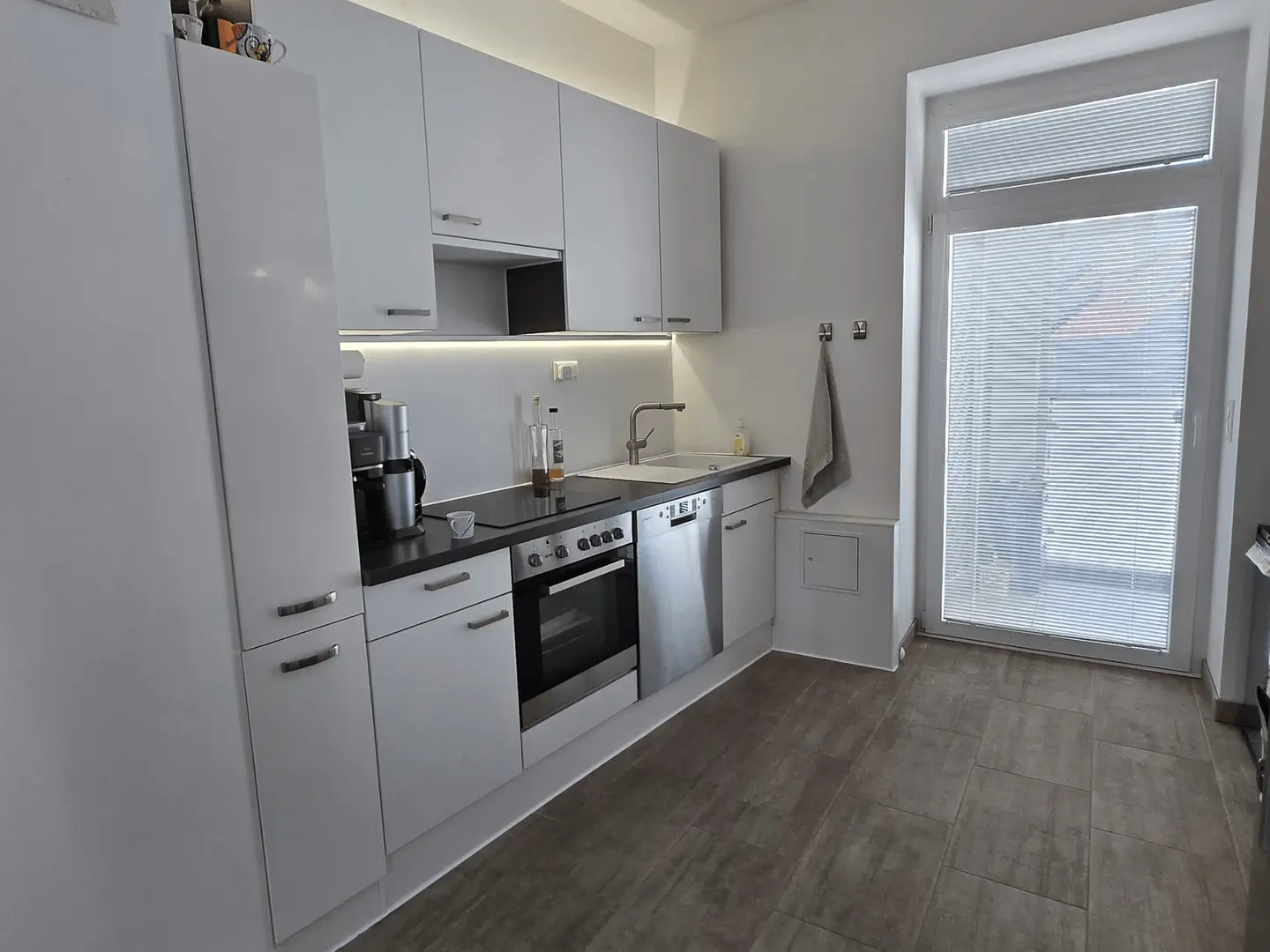 Renovated apartment with loggia and exposed brickwork