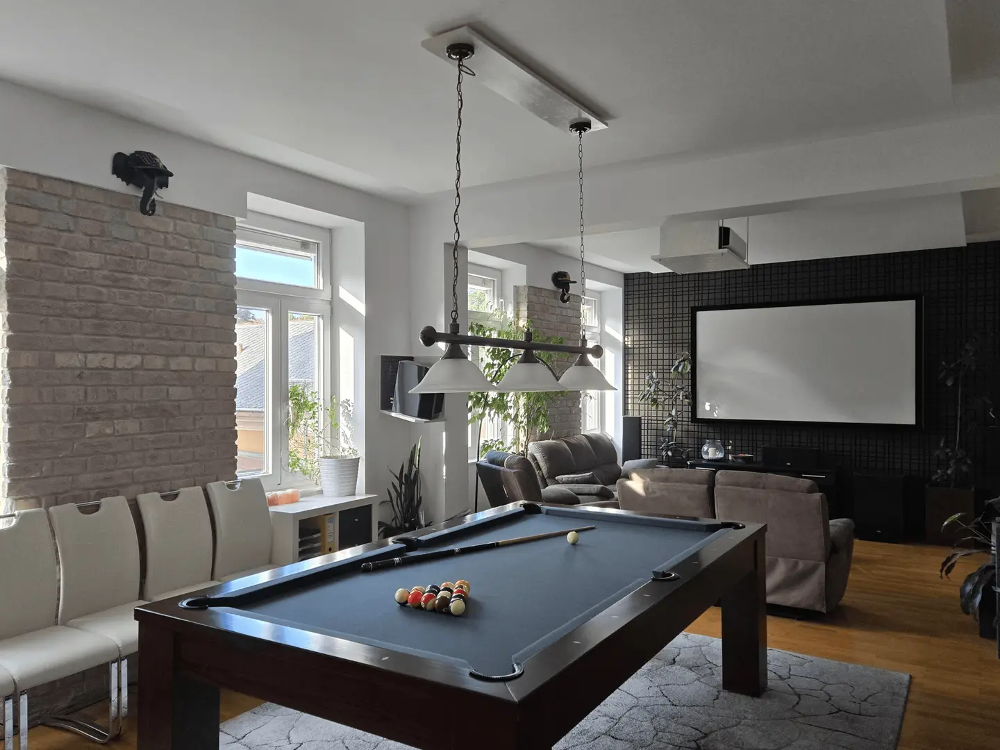 Renovated apartment with loggia and exposed brickwork