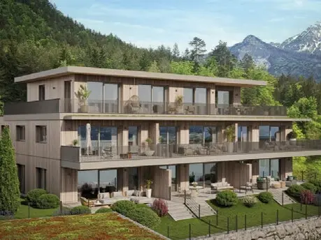 Neubauwohnung with lake view and private garden