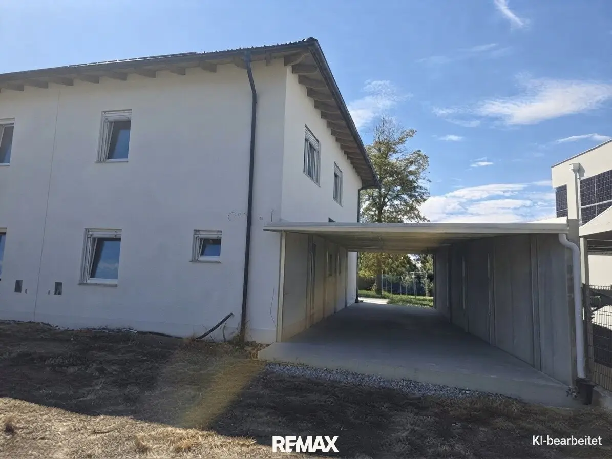 Energieautarke Premium‑Doppelhaushälfte mit Garten