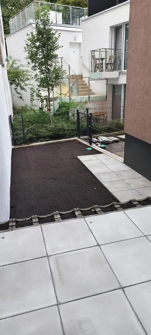 High-quality 2-room apartment with terrace and garden - close to the center