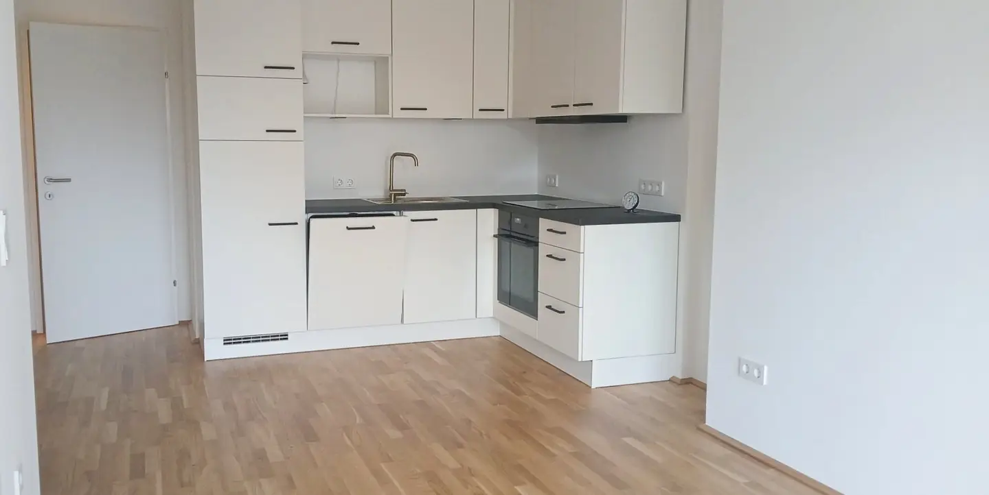 NEUBAU - Top 10 - Wunderschöne 2 Zimmerwohnung mit großem Balkon und eigenem Tiefgaragenplatz