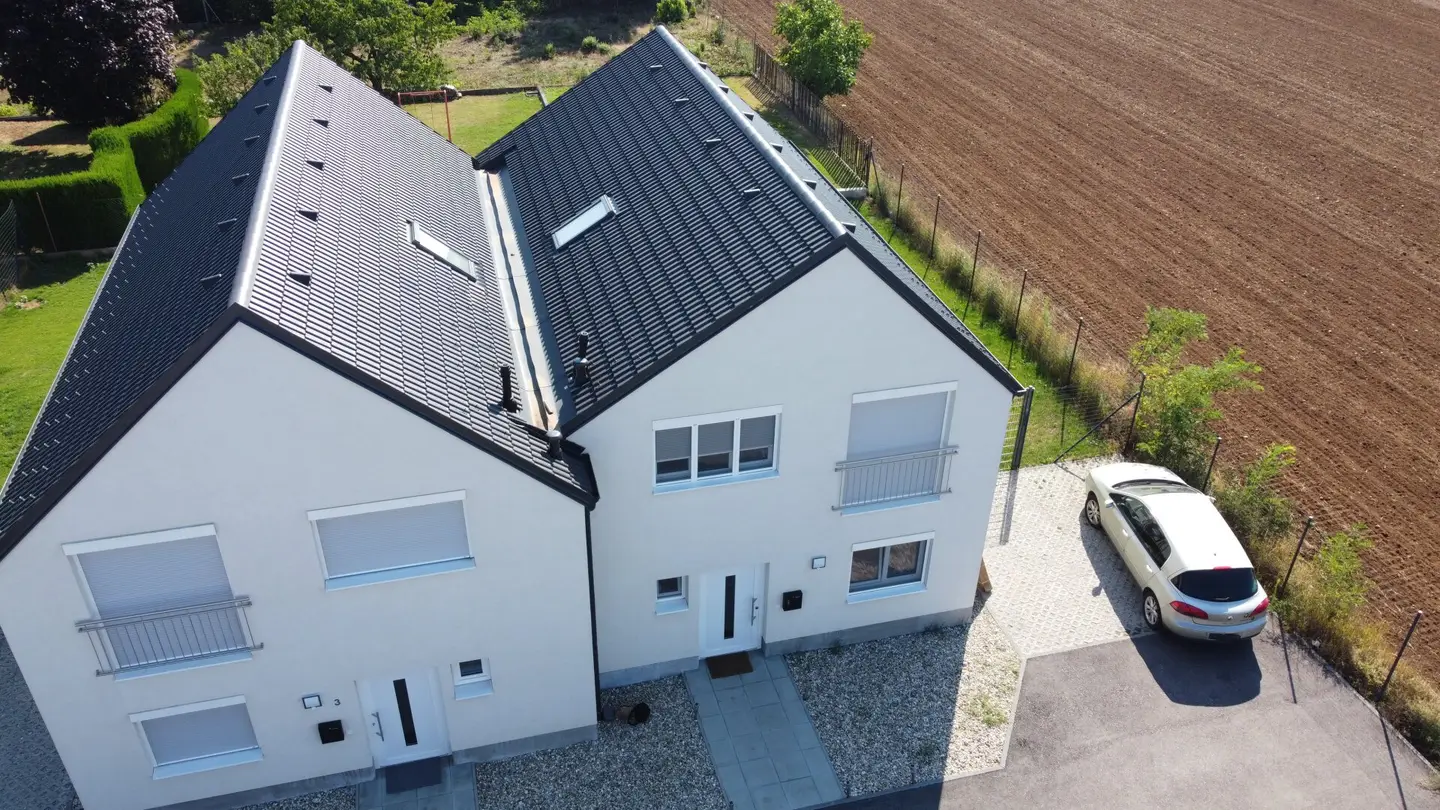 Like-new semi-detached house in Gänserndorf - 4 rooms, cellar, garden, terrace, 2 parking spaces