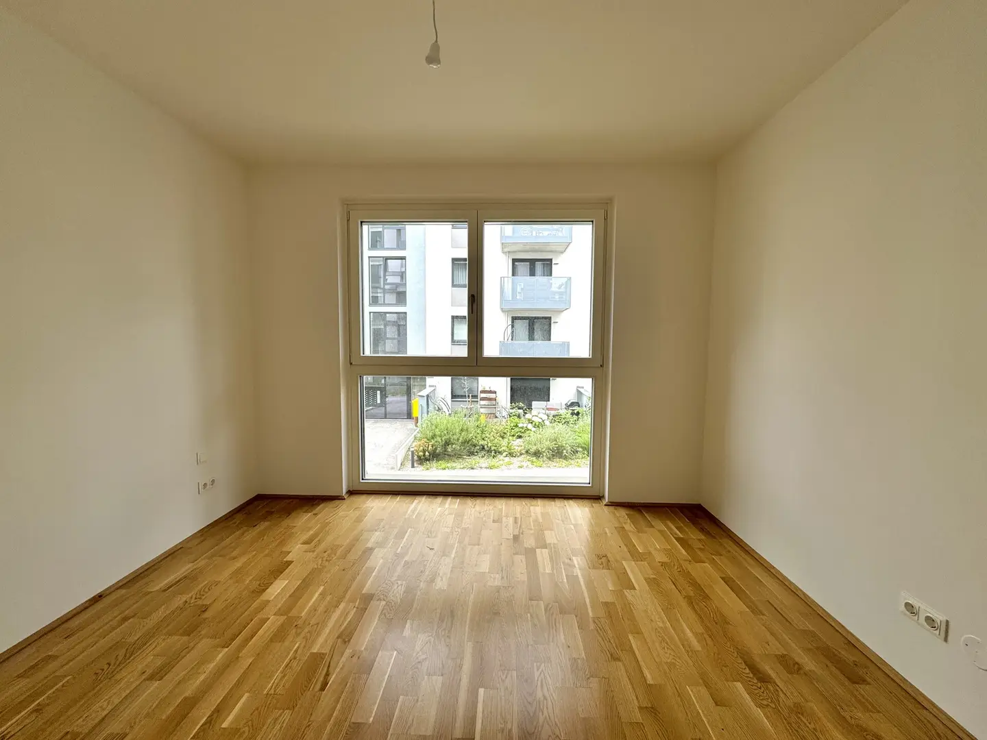 Neubauwohnung mit Balkon in ruhiger autofreier Anlage