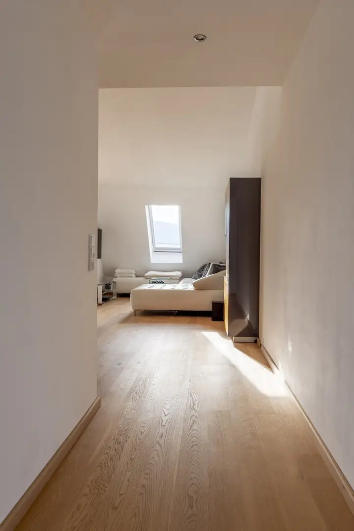Bright Dachgeschosswohnung with panoramic mountain view and large southwest terrace