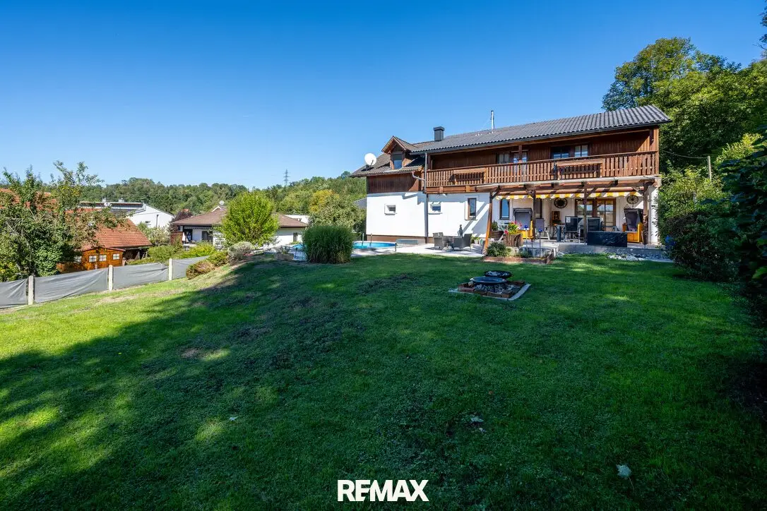 GRÜNDBERGSIEDLUNG | Einfamilienhaus mit traumhaftem Garten, Pool, Carport &amp; Garage in sonniger Grünlage!