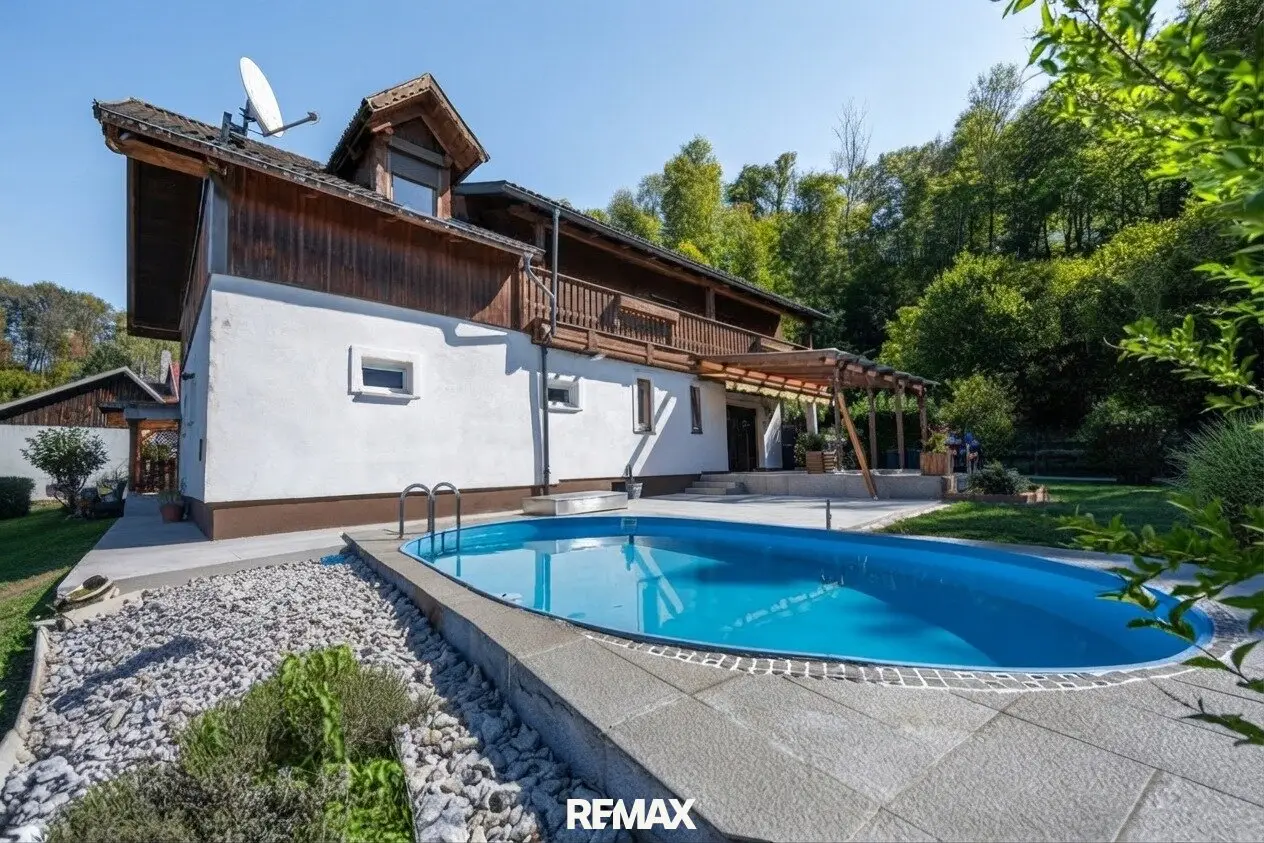 GRÜNDBERGSIEDLUNG | Einfamilienhaus mit traumhaftem Garten, Pool, Carport &amp; Garage in sonniger Grünlage!
