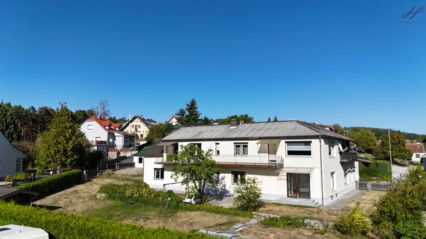 Investment property with potential: 5 residential units | approx. 500 m² usable area | garden, pool &amp; 3 garages