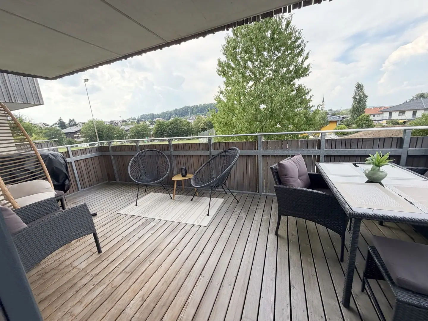 Apartment with generous balcony and carport