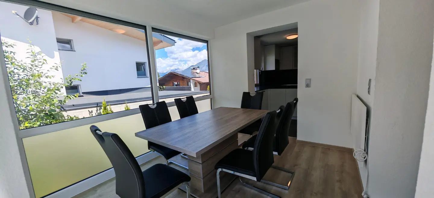 Familienwohnung mit privatem Garten und Wintergarten