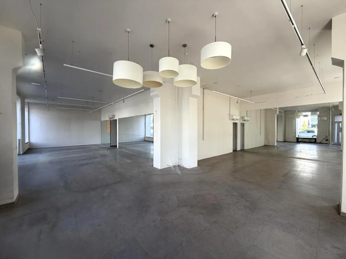 Ground floor apartment with prominent display frontage and storage areas