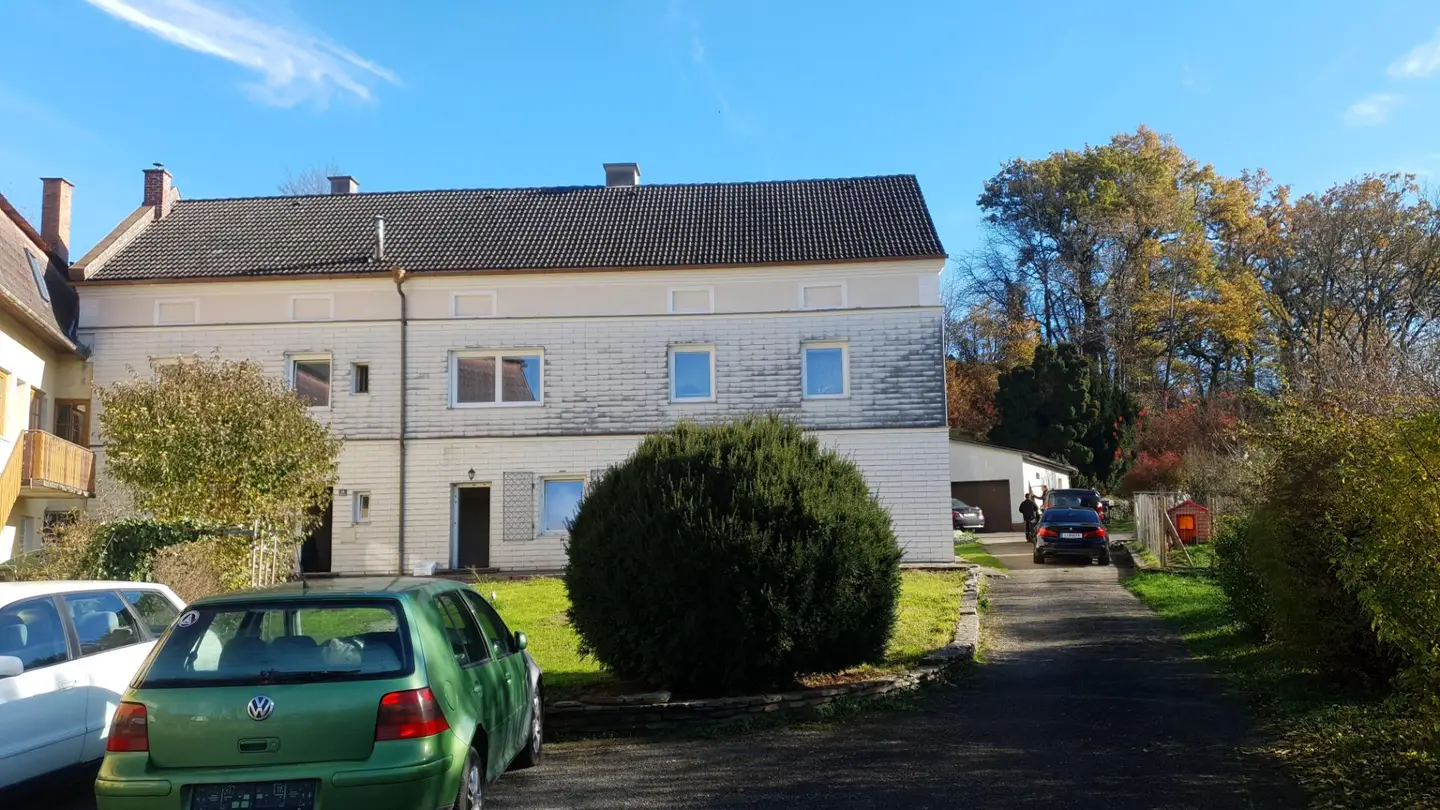 Apartment with garden and garage in central location