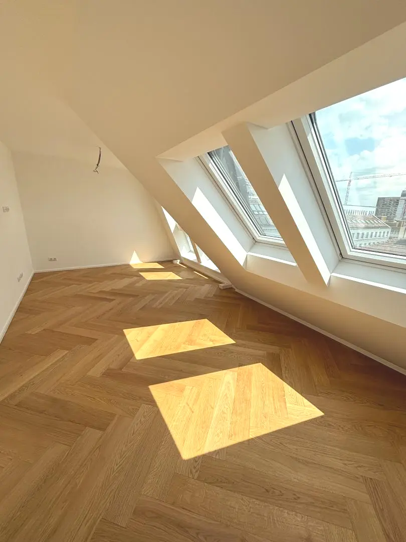 Lichtdurchflutete Dachgeschosswohnung mit Terrasse und Smart Home