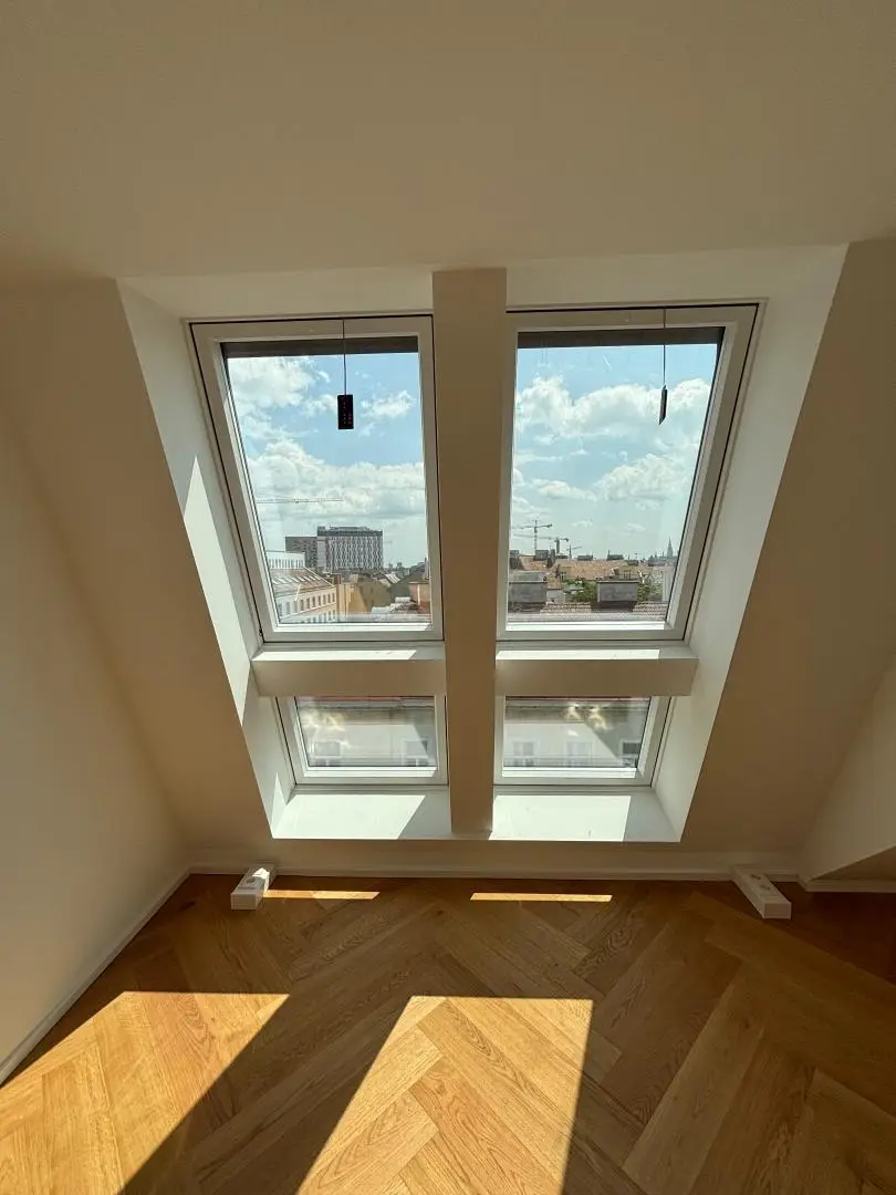 Lichtdurchflutete Dachgeschosswohnung mit Terrasse und Smart Home