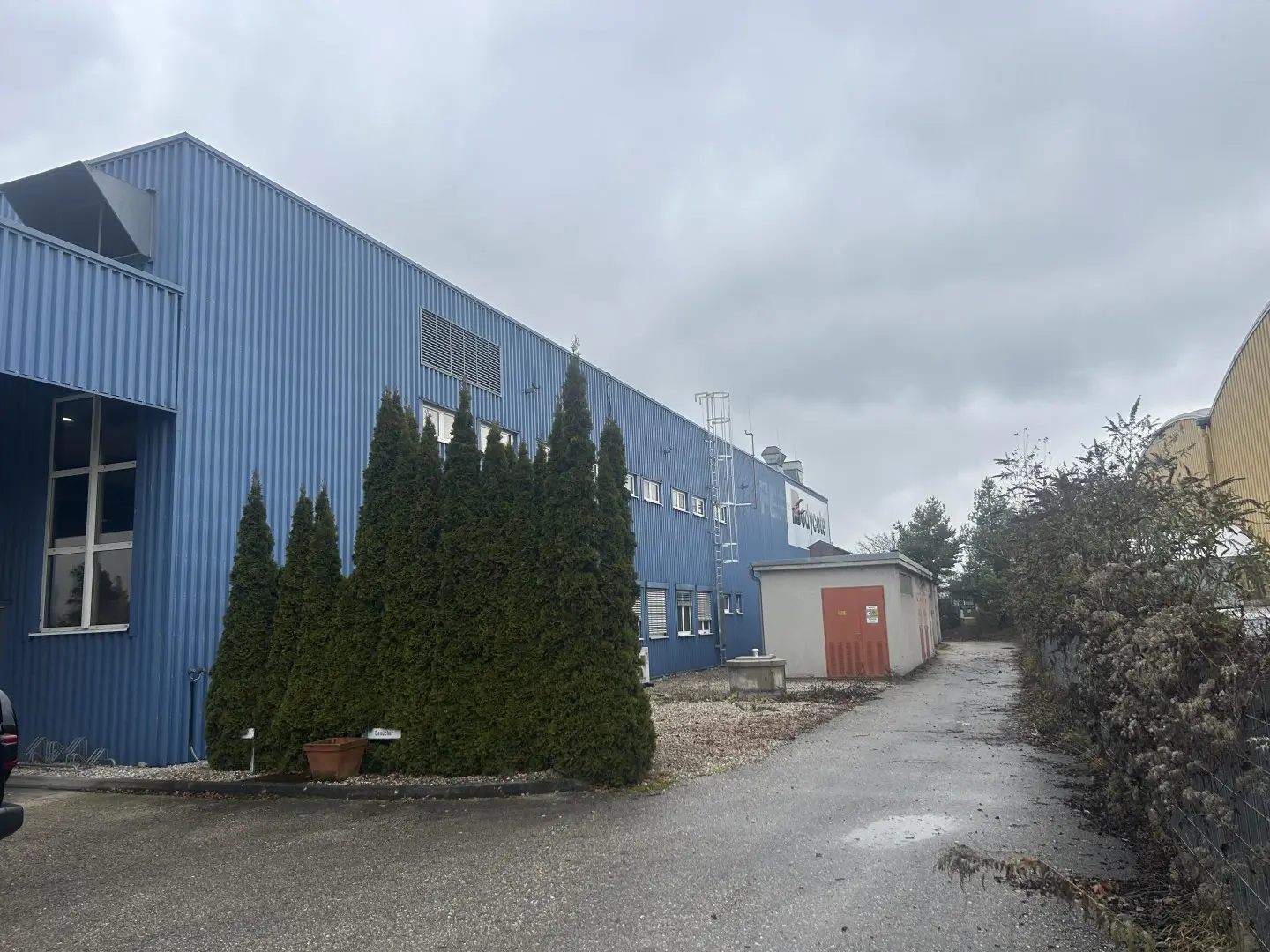 Loft apartment in industrial area with crane systems and office space