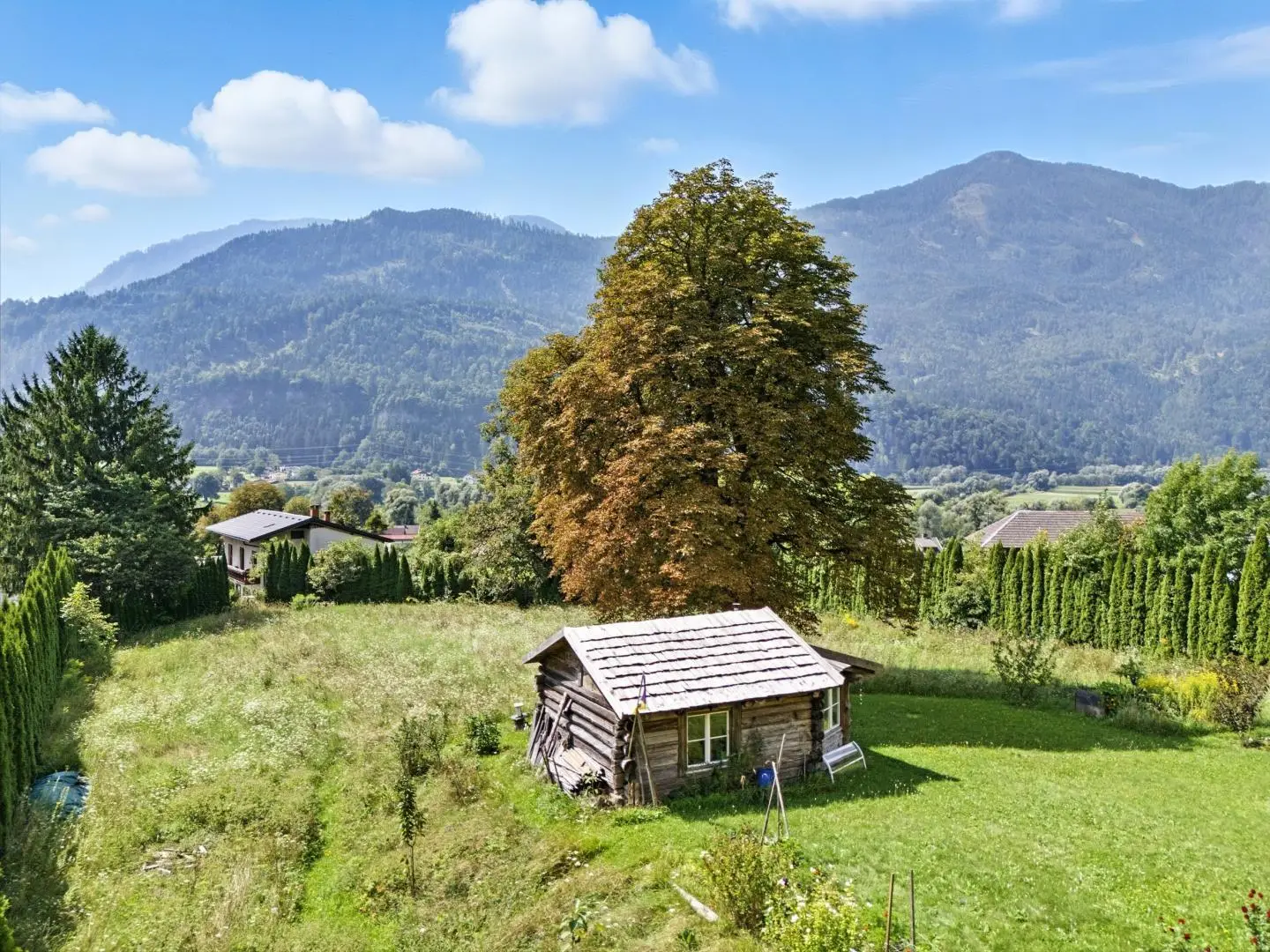 Historisch renovierte Anlegerwohnung mit Garten und Bergblick